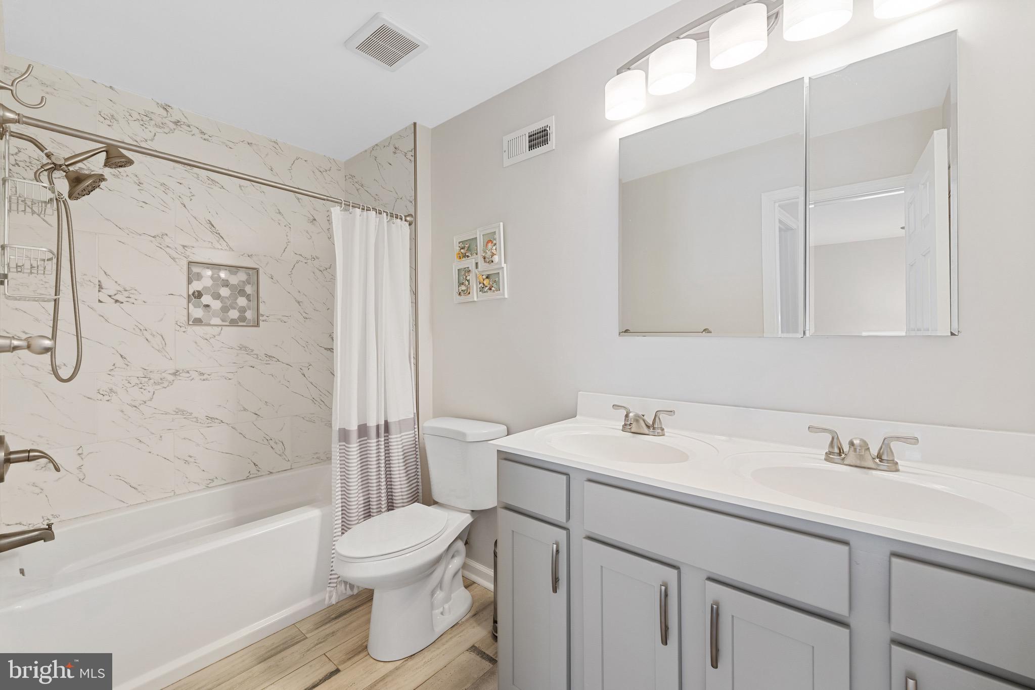 135 Buckingham Way Mount Laurel, NJ 08054 - Photo 21 of 30 a bathroom with a sink toilet and shower