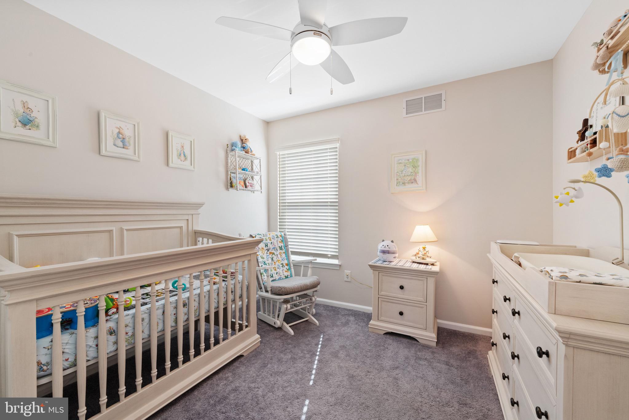 135 Buckingham Way Mount Laurel, NJ 08054 - Photo 23 of 30 a bedroom with furniture and a baby crib
