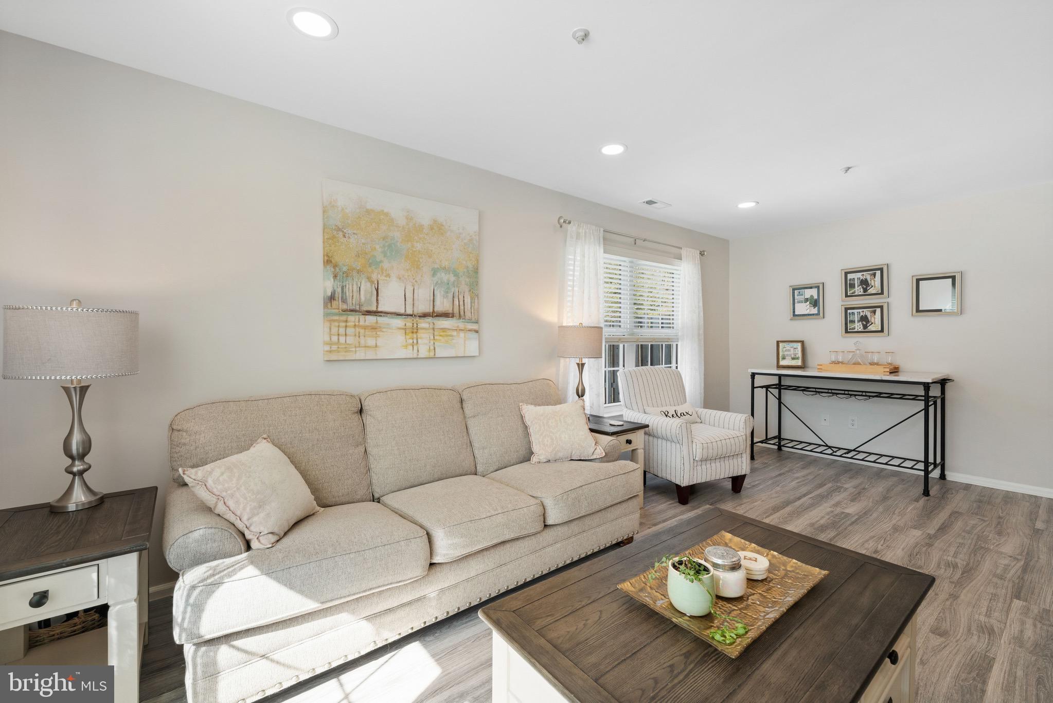 135 Buckingham Way Mount Laurel, NJ 08054 - Photo 8 of 30 a living room with furniture and a rug