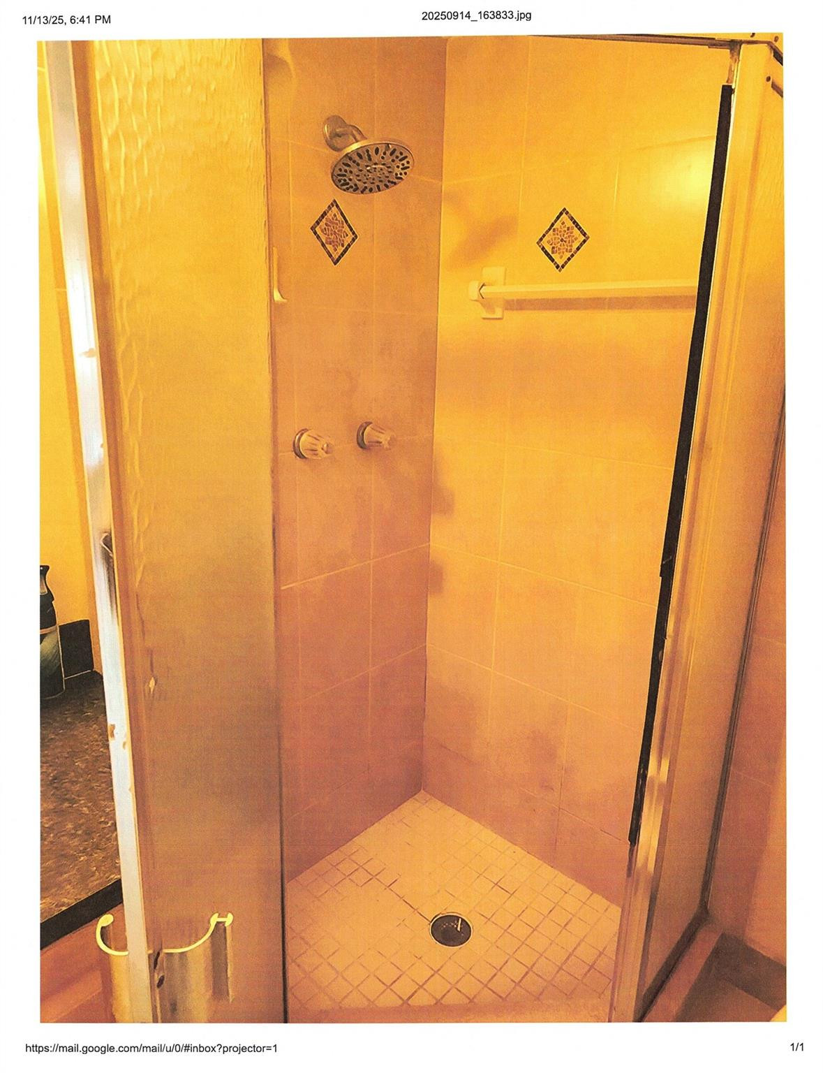 4411 Northwest 16th Street Lauderhill, FL 33313 - Photo 14 of 18 a bathroom with a shower