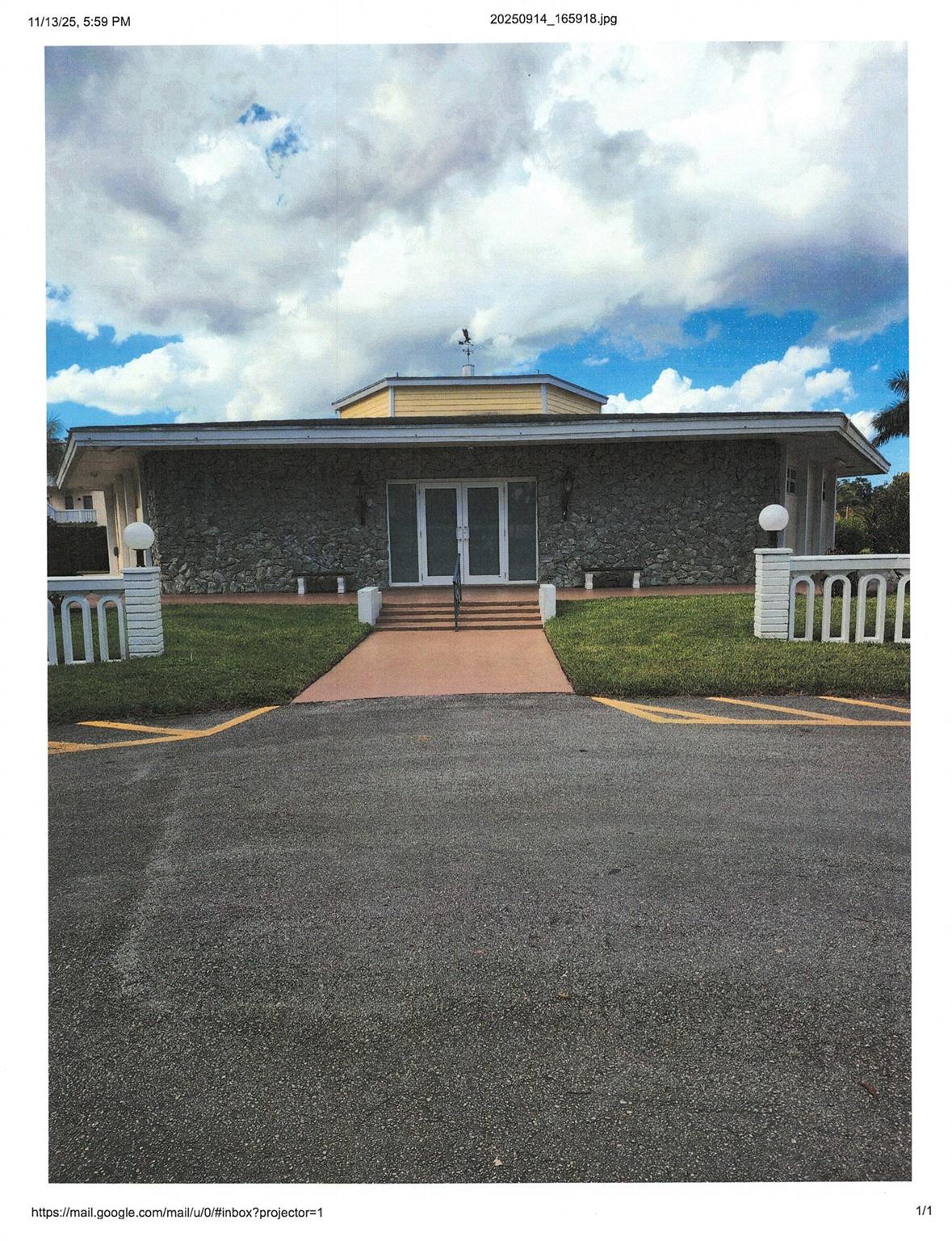 4411 Northwest 16th Street Lauderhill, FL 33313 - Photo 6 of 18 a front view of a house with a yard and garage