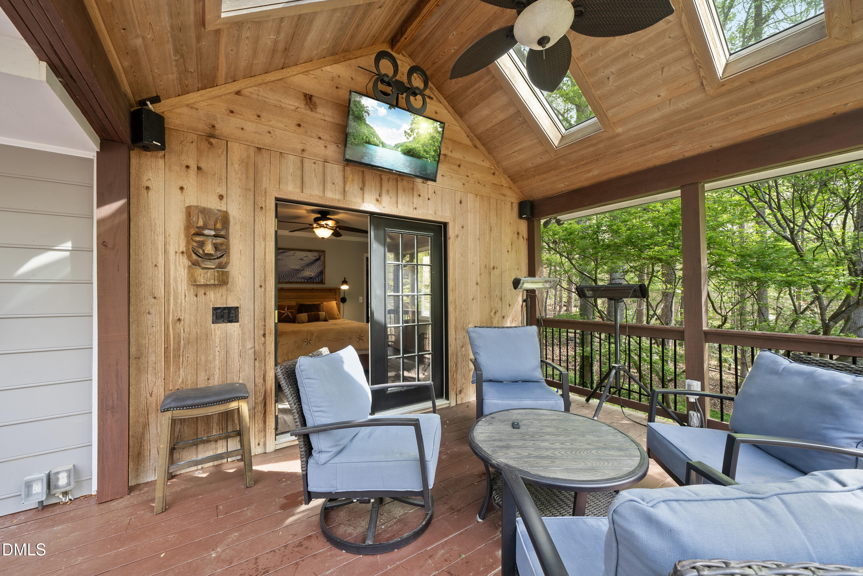6200 Splitrock Trail Apex, NC 27539 - Photo 36 of 64 a view of a patio with a dining table and chairs