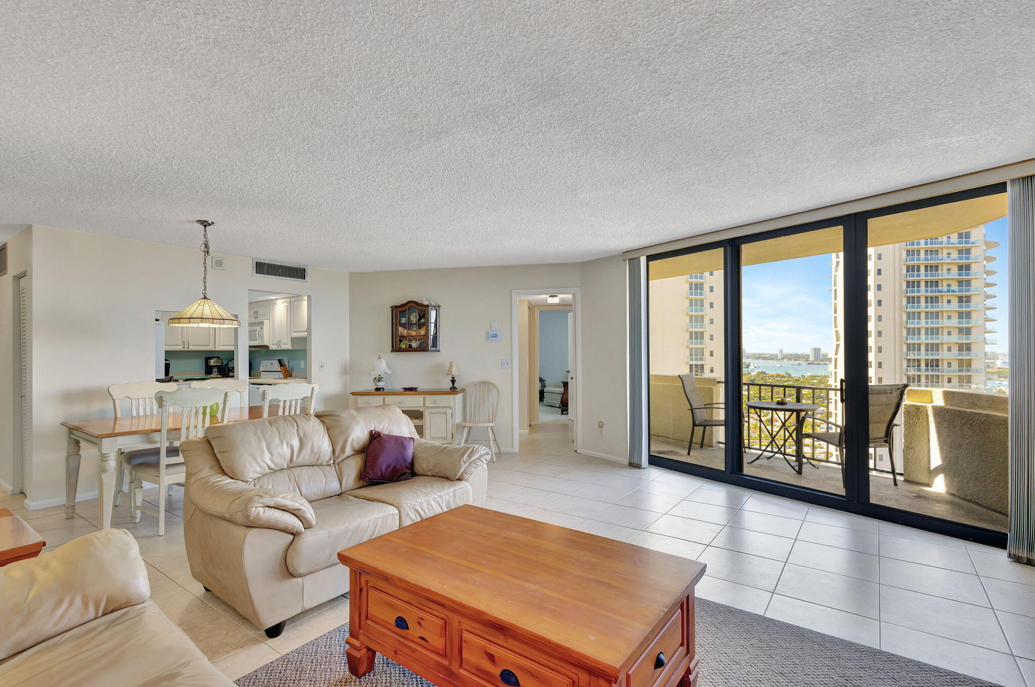 2800 North Ocean Drive, Unit A24B Singer Island, FL 33404 - Photo 11 of 65 a living room with furniture and a large window