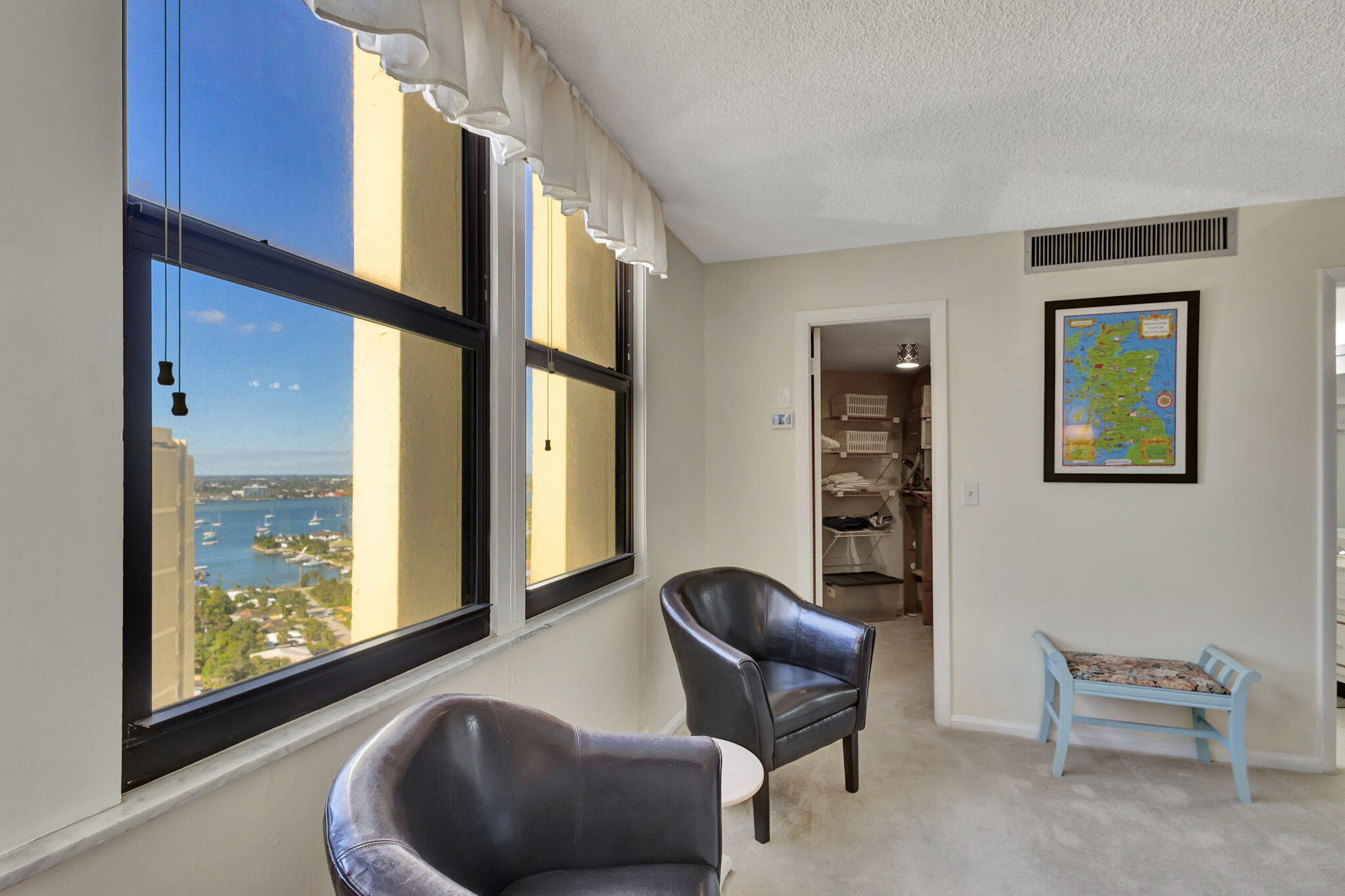 2800 North Ocean Drive, Unit A24B Singer Island, FL 33404 - Photo 18 of 65 a living room with furniture and large windows