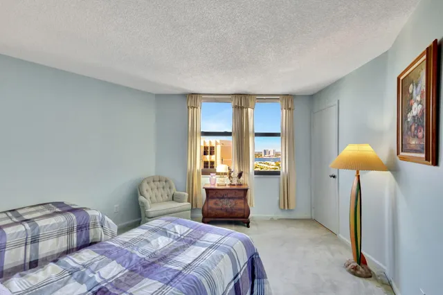 a view of a balcony with chairs