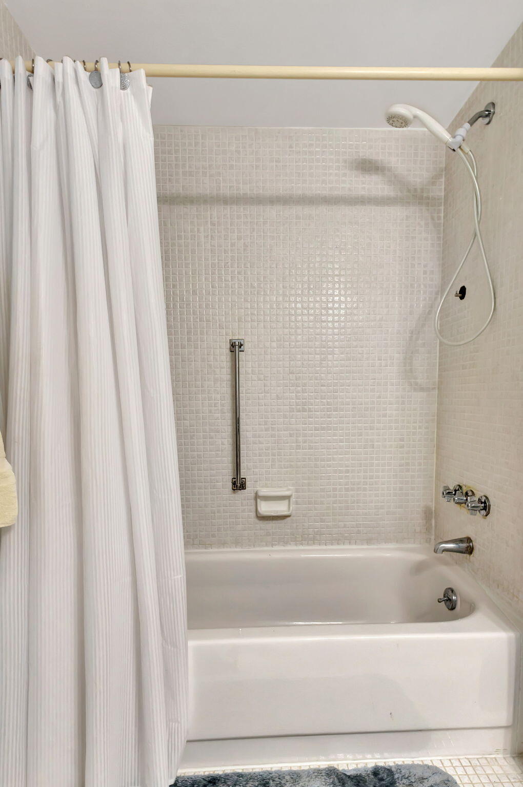 2800 North Ocean Drive, Unit A24B Singer Island, FL 33404 - Photo 25 of 65 a bathroom with a shower and a bath tub