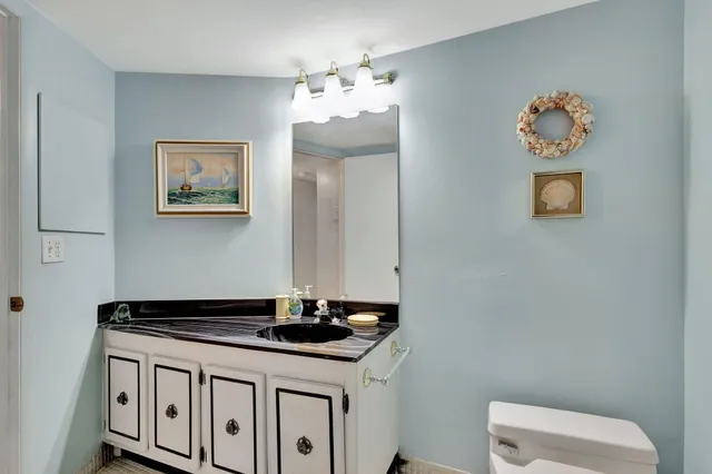 a view of a balcony with furniture and a city view