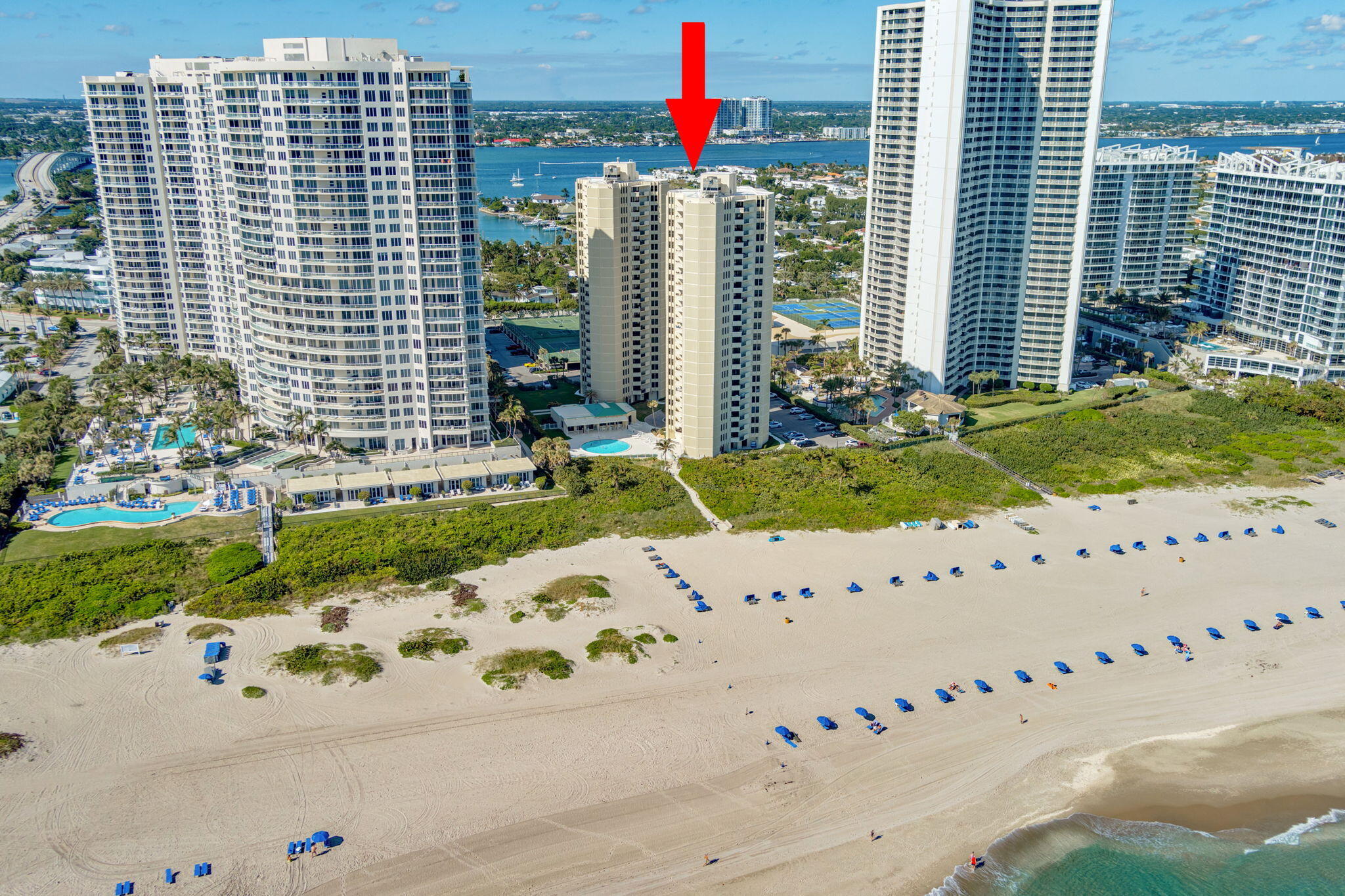 2800 North Ocean Drive, Unit A24B Singer Island, FL 33404 - Photo 59 of 65 a front view of a building with garden