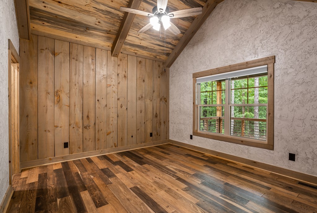 1450 Twisted Oak Road Talking Rock, GA 30175 - Photo 29 of 59 a view of a room with wooden floor and windows