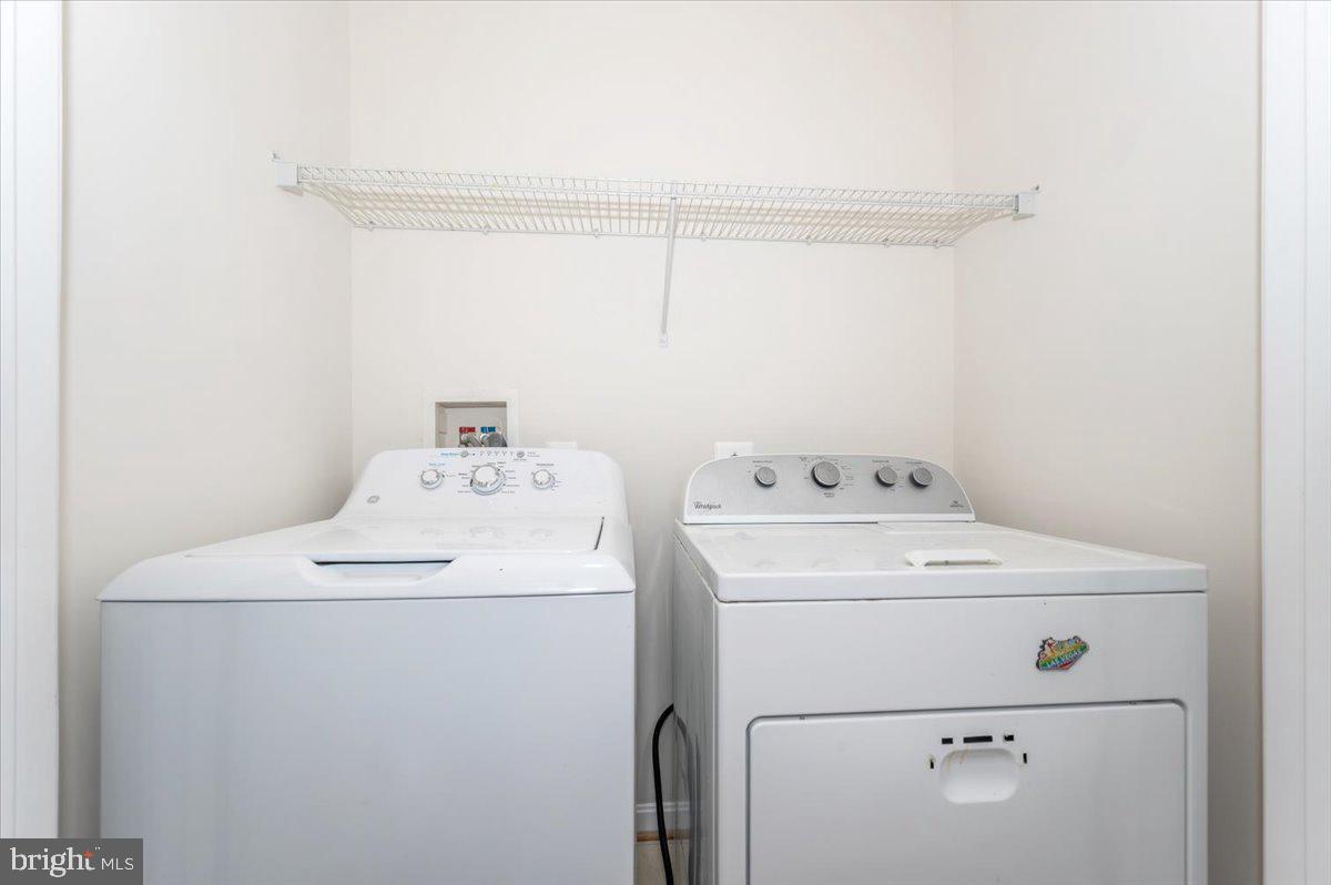 23029 Birch Mead Road Clarksburg, MD 20871 - Photo 21 of 30 a utility room with dryer and washer