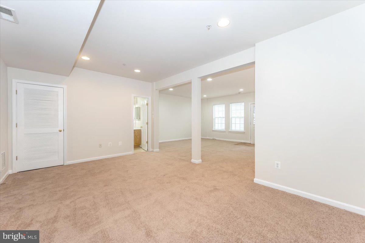 23029 Birch Mead Road Clarksburg, MD 20871 - Photo 25 of 30 an empty room with windows and closet