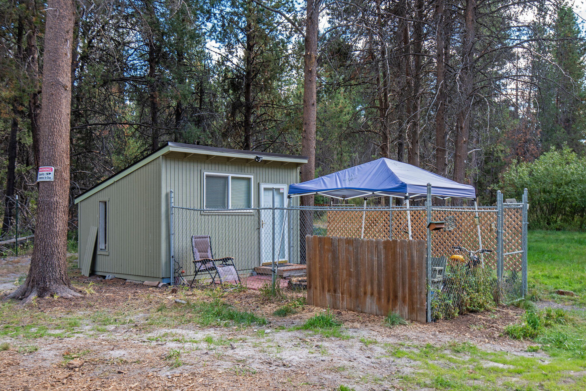 16868 Hermosa Road Bend, OR 97707 - Photo 39 of 40 a view of a small house in the forest