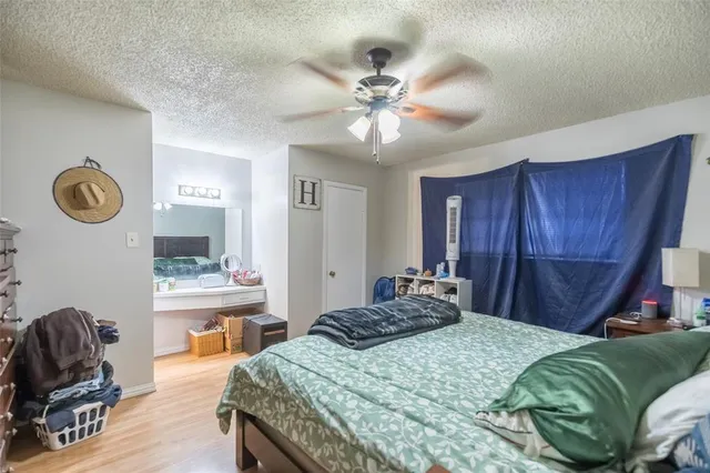 a bathroom with a sink toilet and mirror