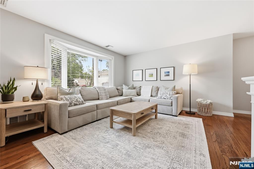 77 White Pond Road Waldwick, NJ 07463 - Photo 7 of 33 a living room with furniture and a large window
