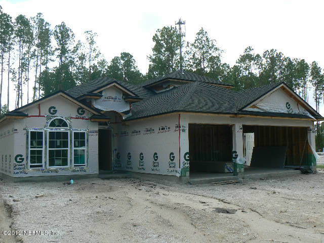 177 Irish Rose Road St. Augustine, FL 32092 - Photo 1 of 38 a view of a house with a yard and garage