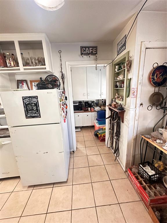 426 Goodyear Street Irving, TX 75062 - Photo 9 of 15 a storage room with washer and dryer