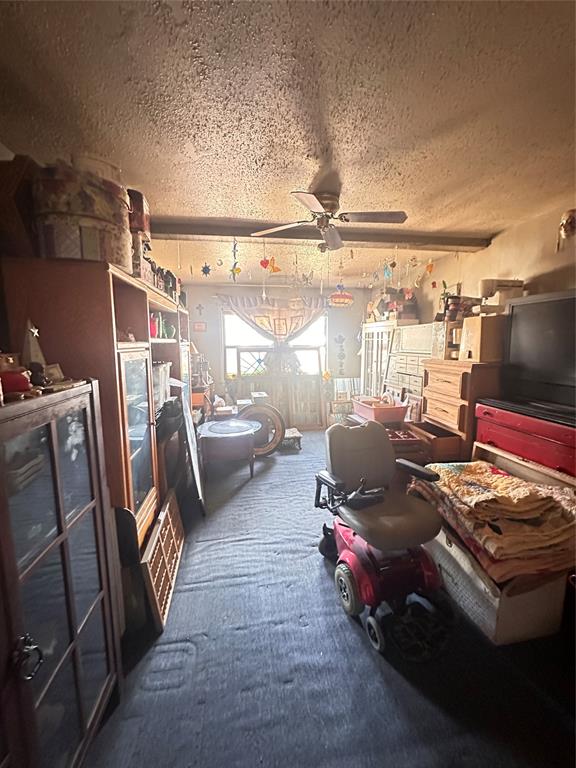 426 Goodyear Street Irving, TX 75062 - Photo 10 of 15 a gym room with furniture and a window