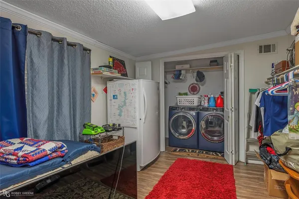 a bed room with a bed and a book shelf