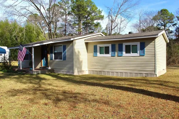 a view of a house with snow on the wall