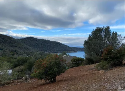 a view of a lake with mountains in the background