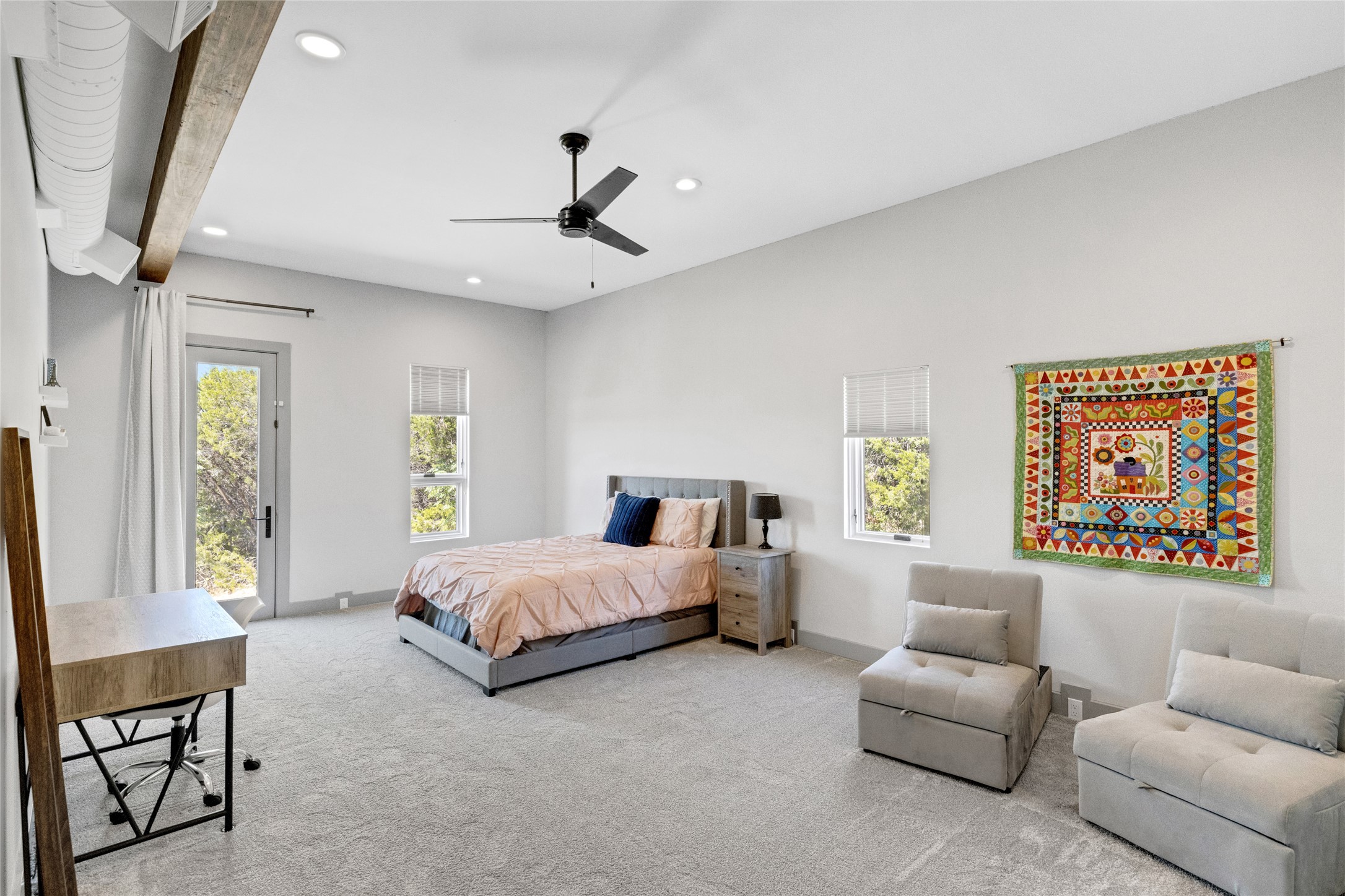 4227 Eck Lane Austin, TX 78734 - Photo 19 of 30 Bedroom with multiple windows, carpet floors, recessed lighting, ceiling fan, and access to exterior