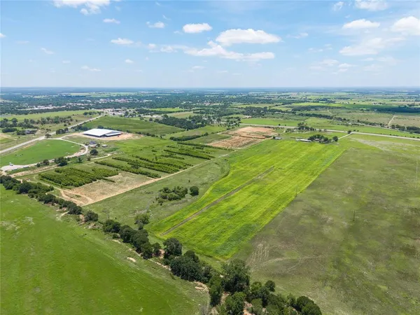 a view of an ocean and city