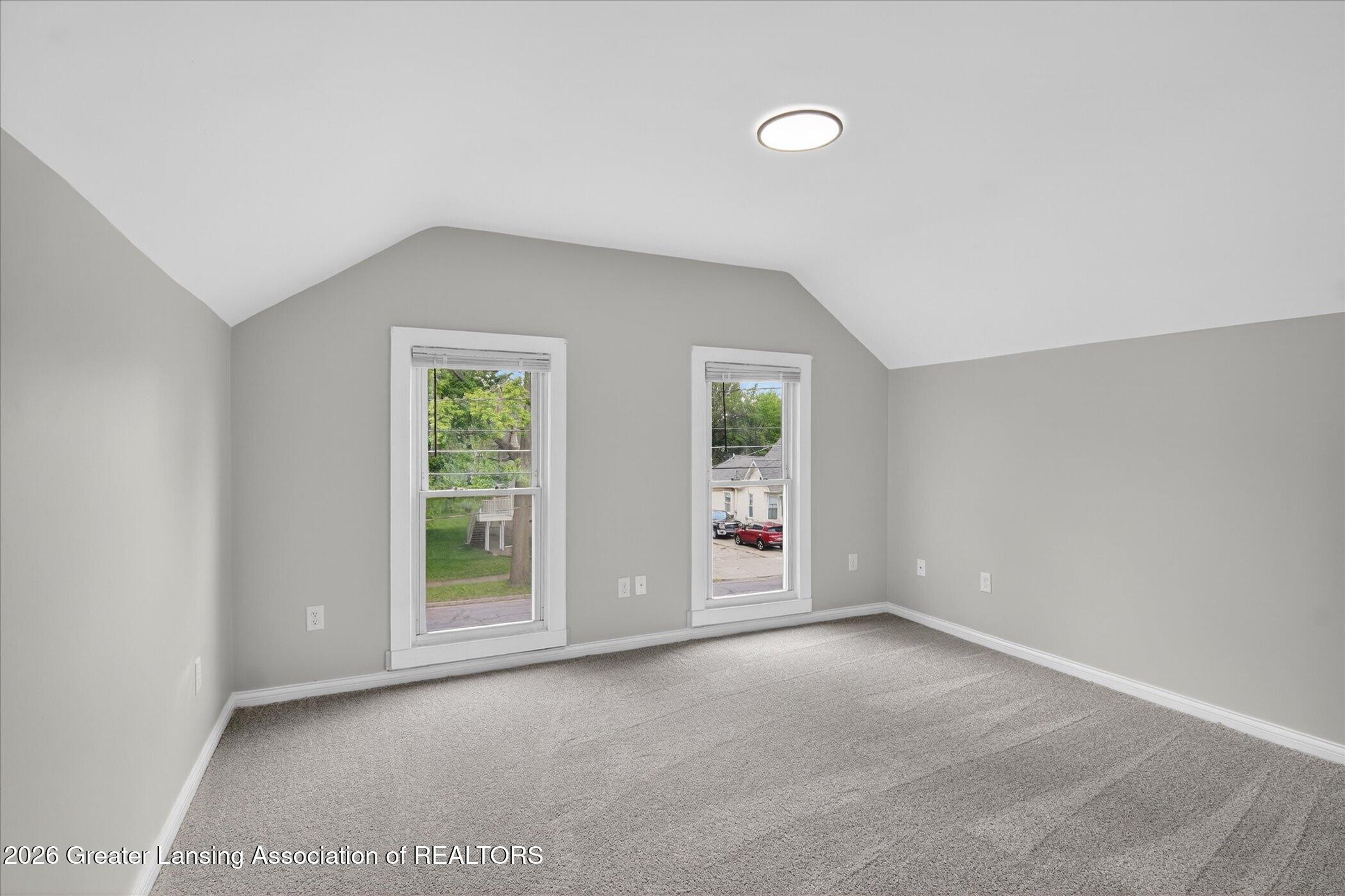 513 North Waterloo Avenue Jackson, MI 49201 - Photo 25 of 40 26-513-N-Waterloo-Ave-WindowStill