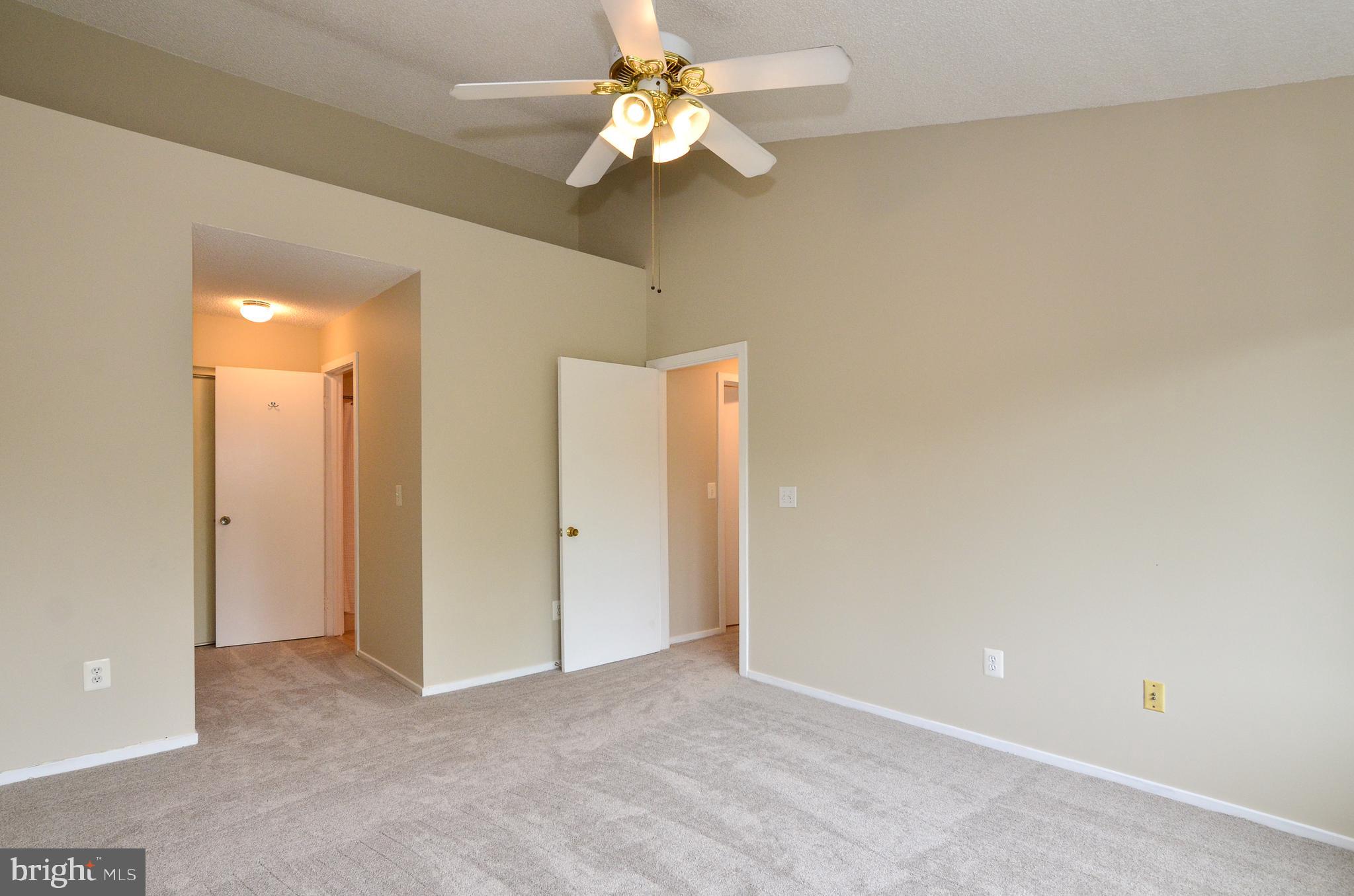 1500 Summerchase Court, Unit 1500E Reston, VA 20194 - Photo 16 of 26 Primary bedroom has dual closets