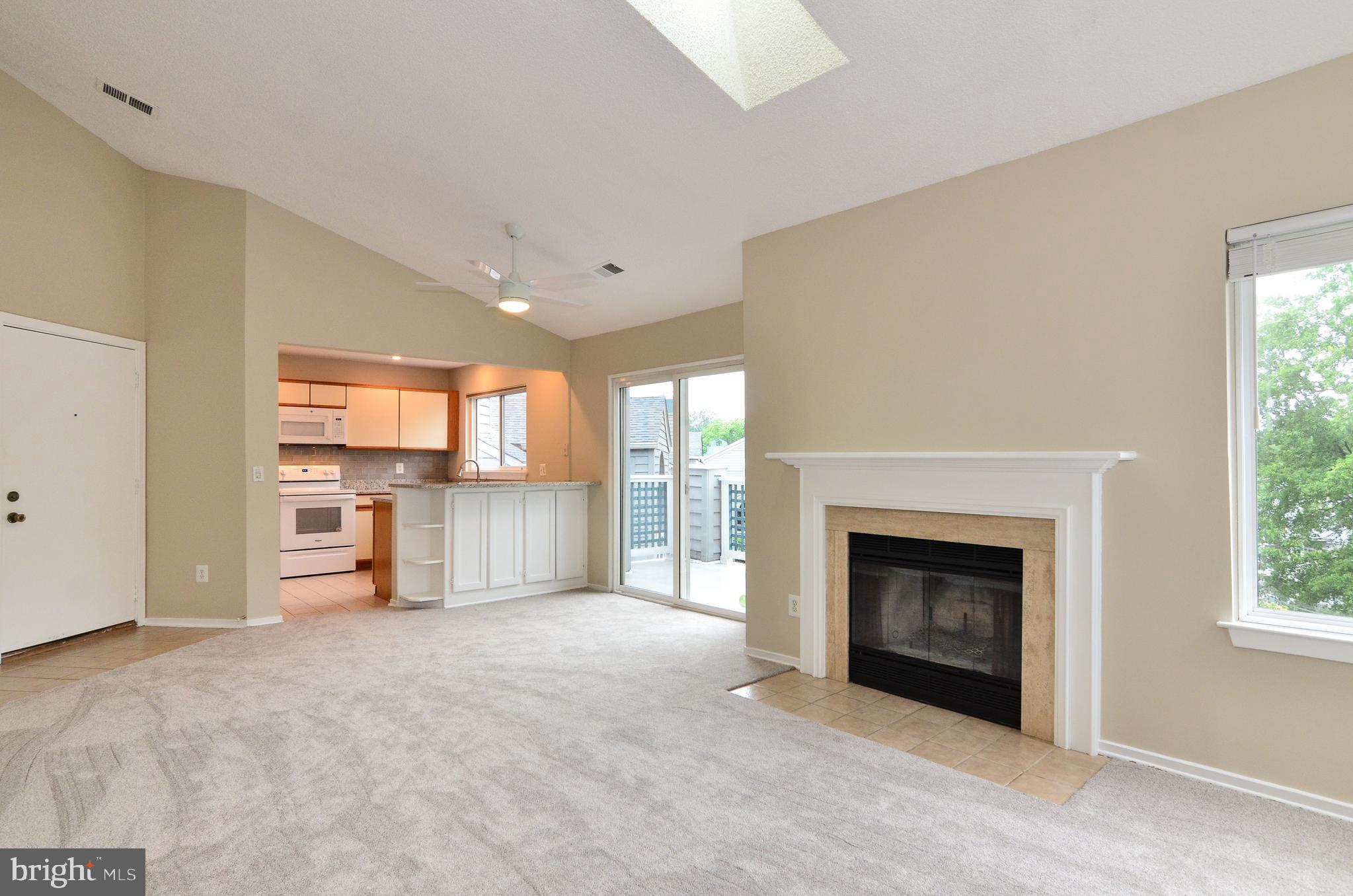 1500 Summerchase Court, Unit 1500E Reston, VA 20194 - Photo 4 of 26 Top floor unit with vaulted ceilings