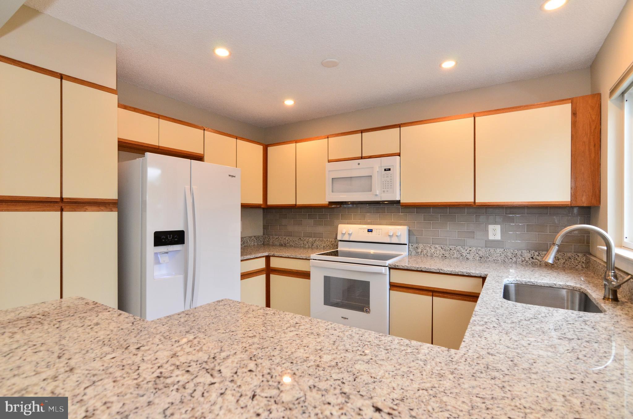 1500 Summerchase Court, Unit 1500E Reston, VA 20194 - Photo 8 of 26 Ample cabinet space