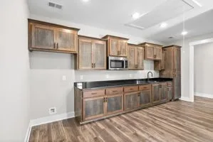 a view of a kitchen with electric appliances