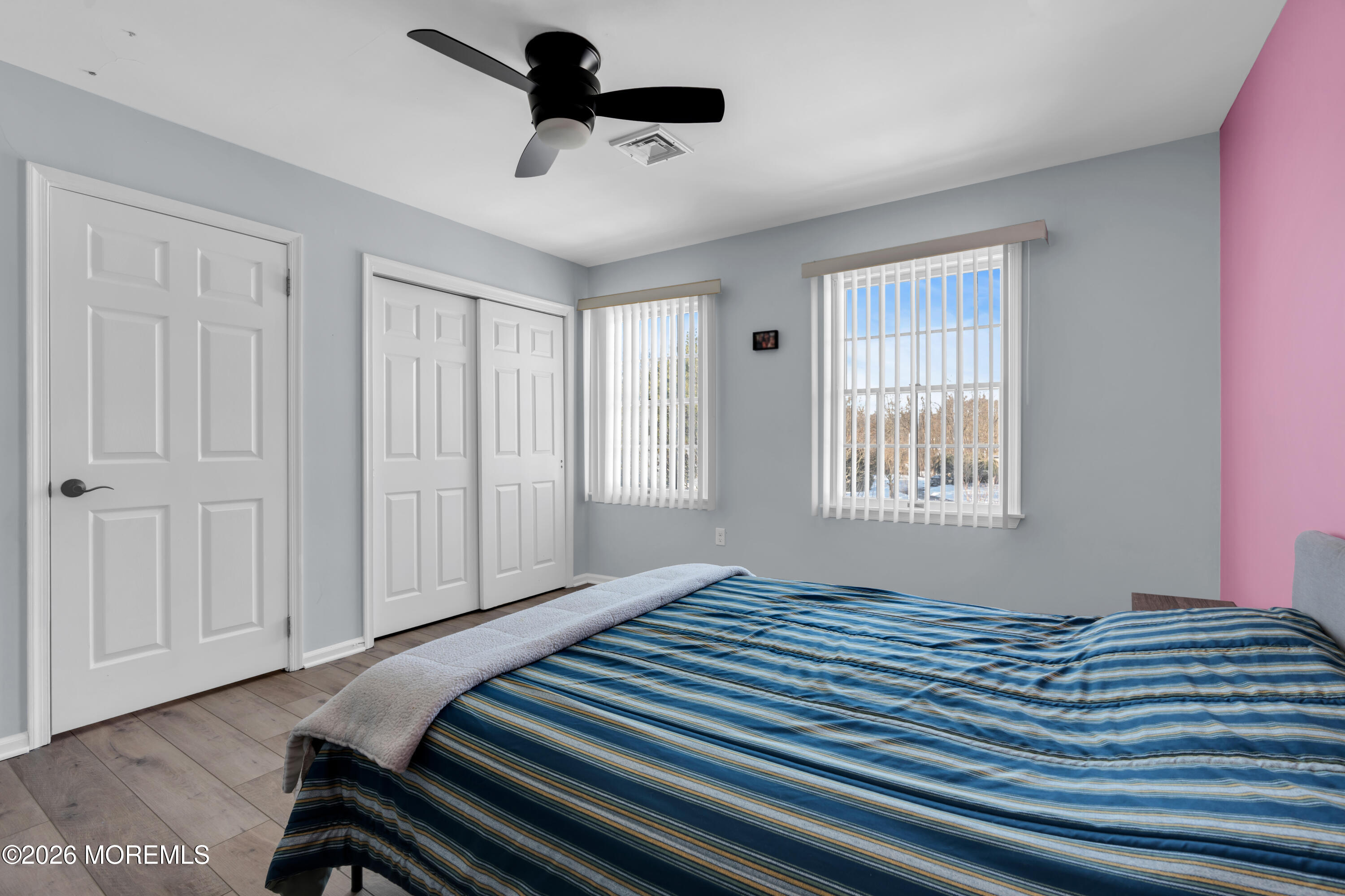 15 Lenape Trail Freehold, NJ 07728 - Photo 13 of 27 a bedroom with a bed and a window