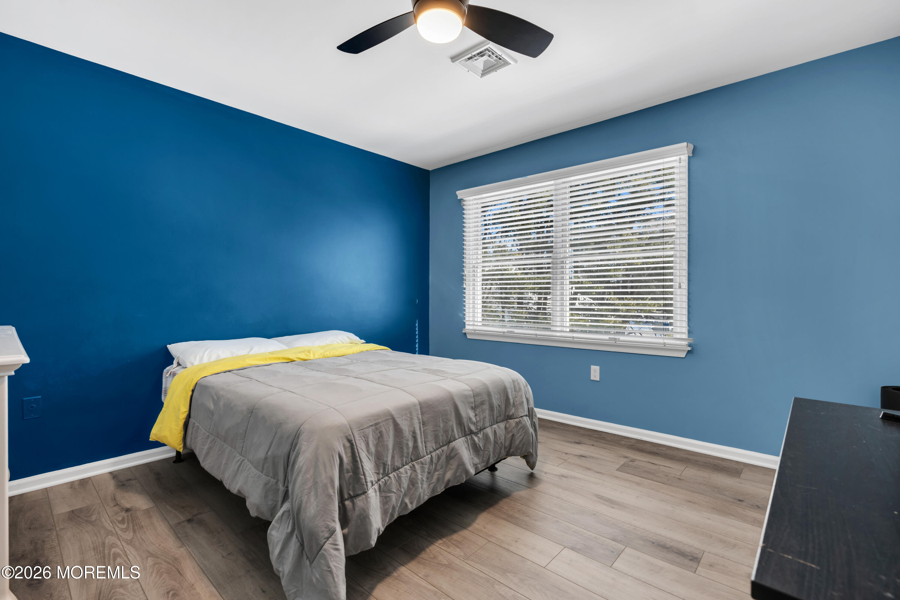 15 Lenape Trail Freehold, NJ 07728 - Photo 14 of 27 a bed sitting in a bedroom next to a window