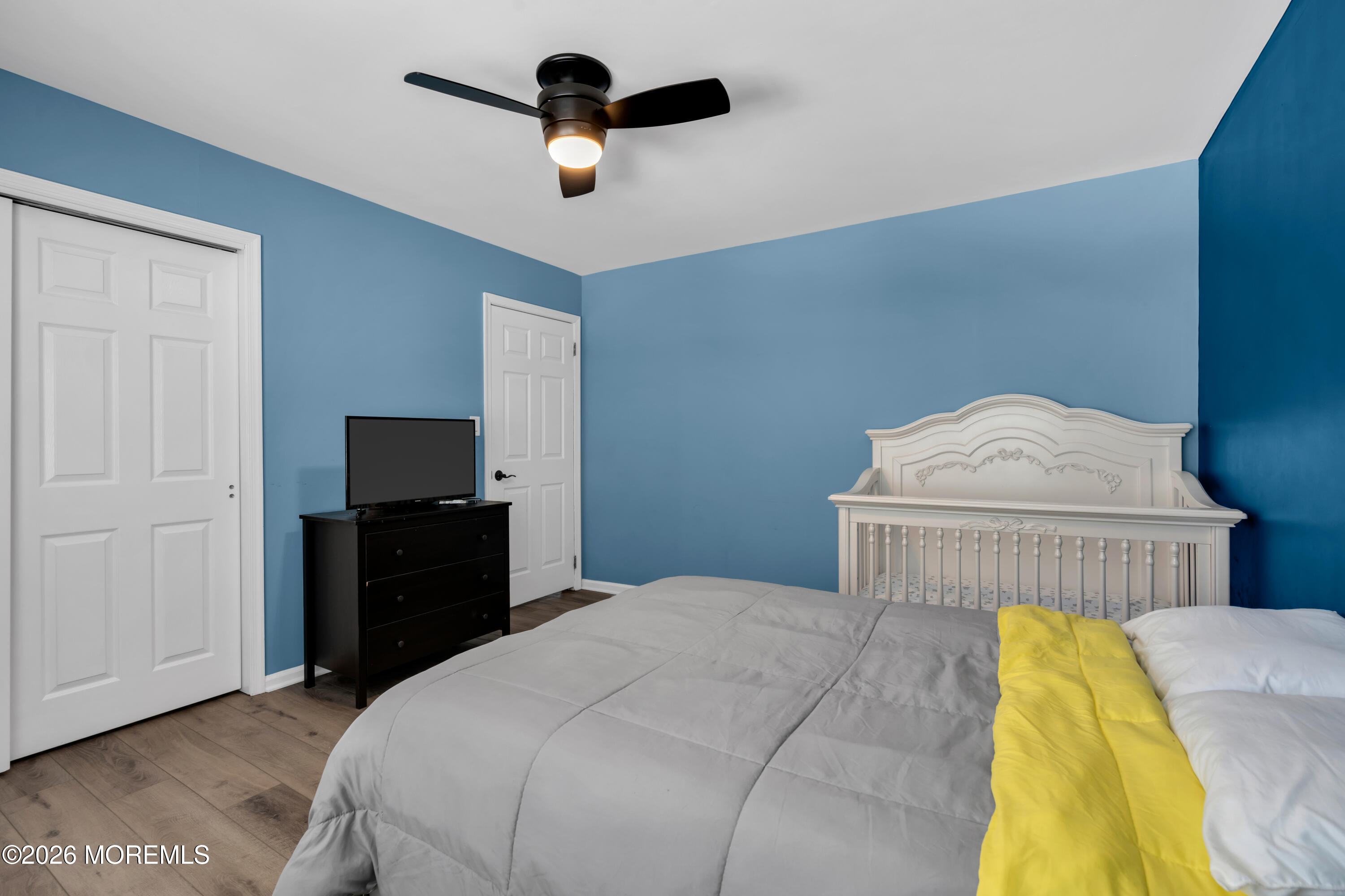 15 Lenape Trail Freehold, NJ 07728 - Photo 15 of 27 a bedroom with a bed and a tv