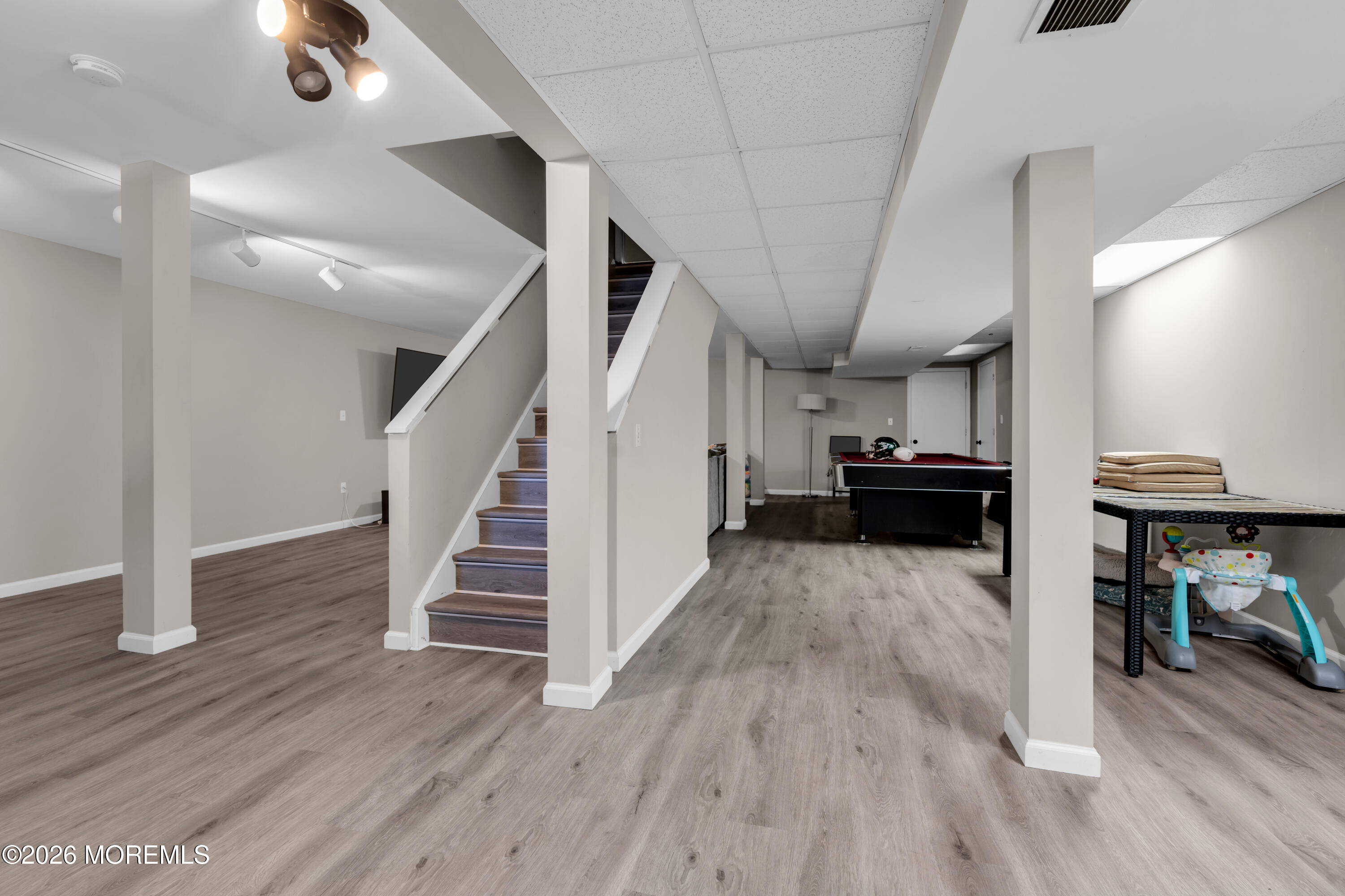 15 Lenape Trail Freehold, NJ 07728 - Photo 19 of 27 a view of a livingroom with wooden floor and furniture