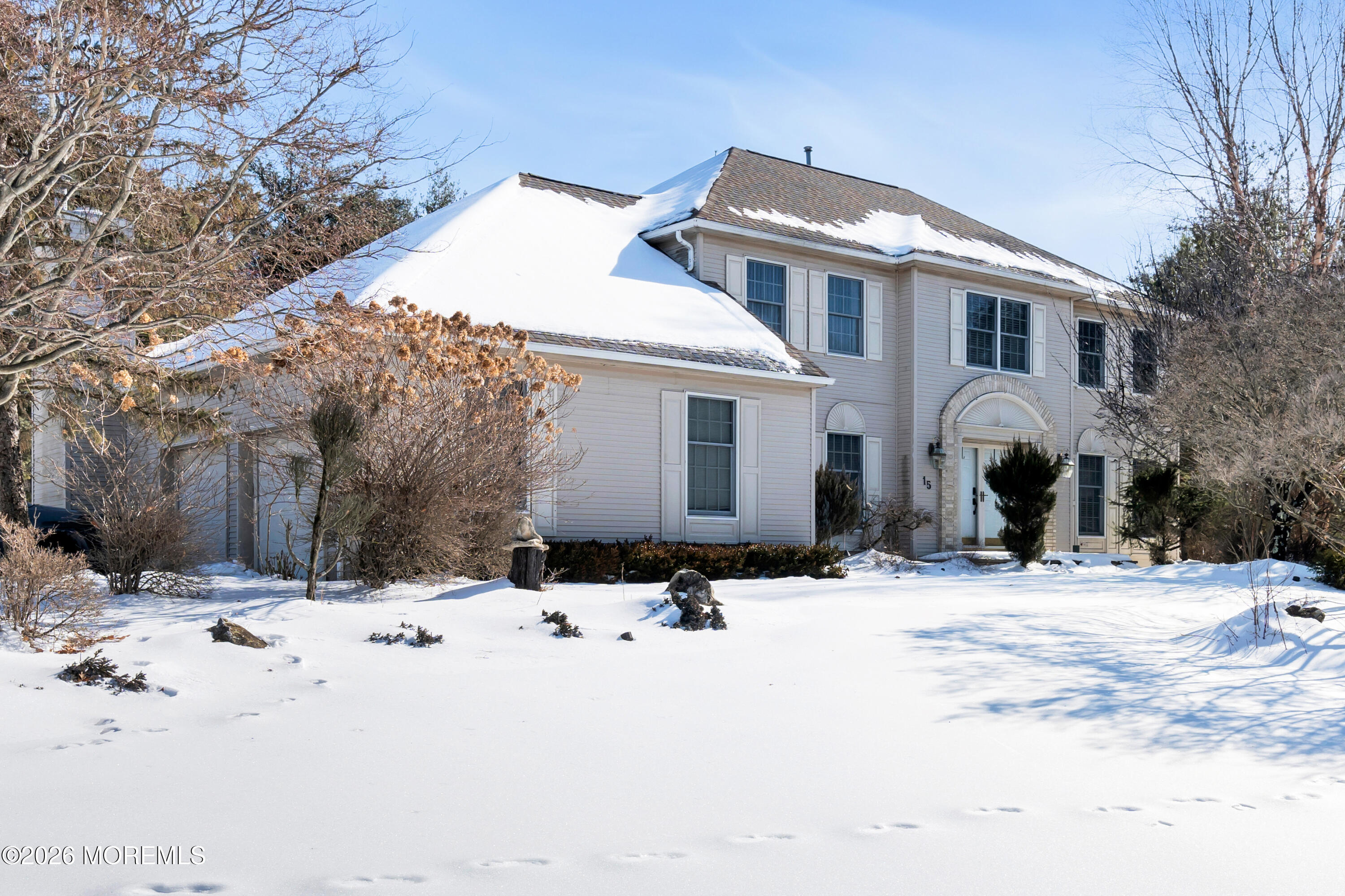 15 Lenape Trail Freehold, NJ 07728 - Photo 22 of 27 a view of white house with snow on the road