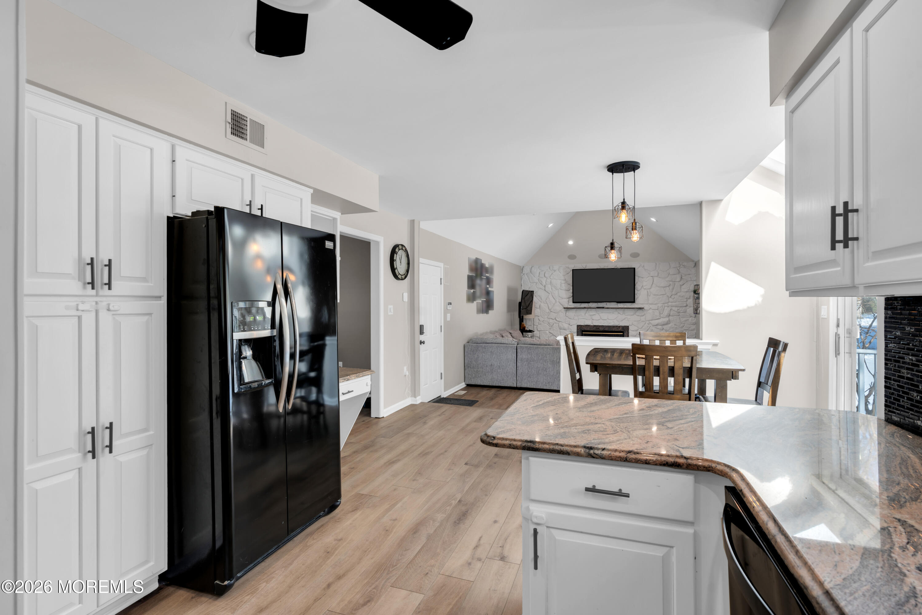 15 Lenape Trail Freehold, NJ 07728 - Photo 8 of 27 a kitchen with stainless steel appliances granite countertop a refrigerator and a sink