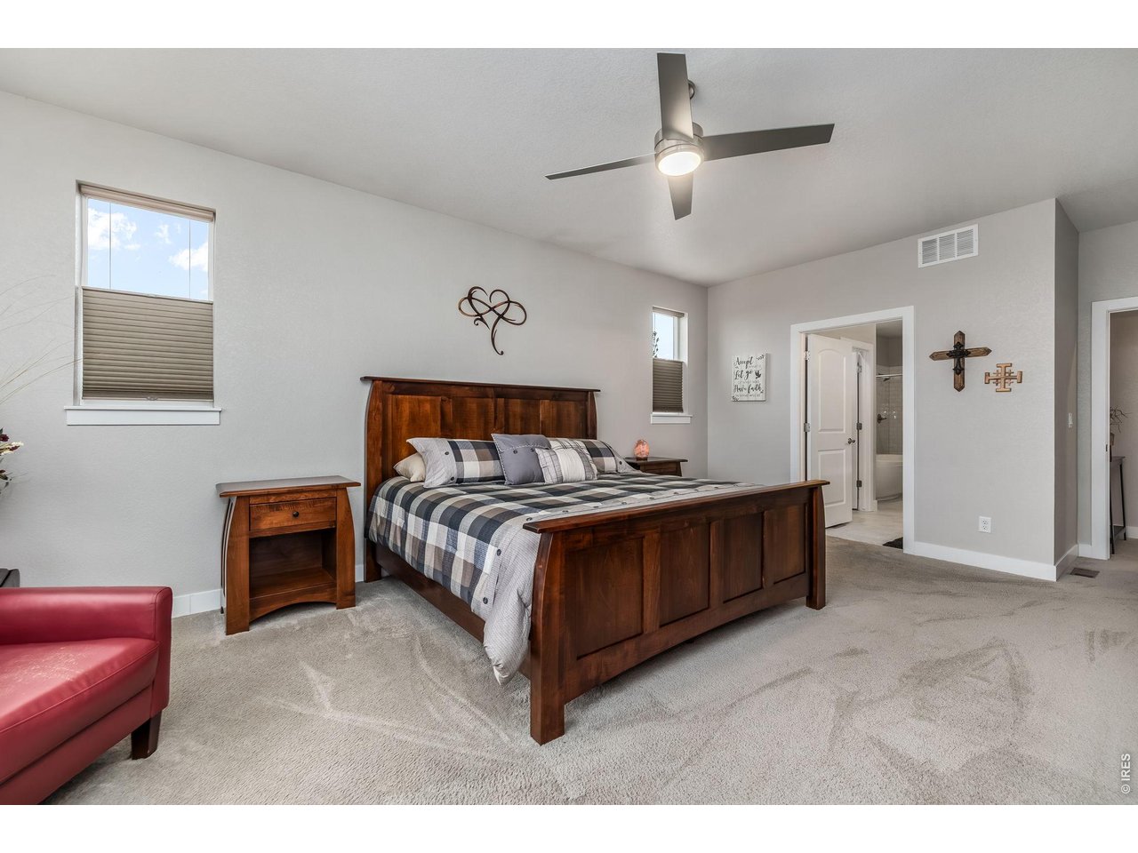 3789 Bridle Ridge Circle Severance, CO 80524 - Photo 23 of 44 a bedroom with a bed and ceiling fan