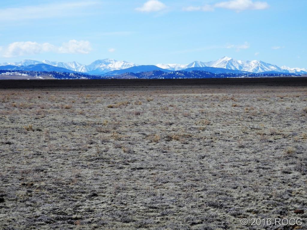 7434 Larimer Road Hartsel, CO 80449 - Photo 1 of 11 a view of a lake and mountain view