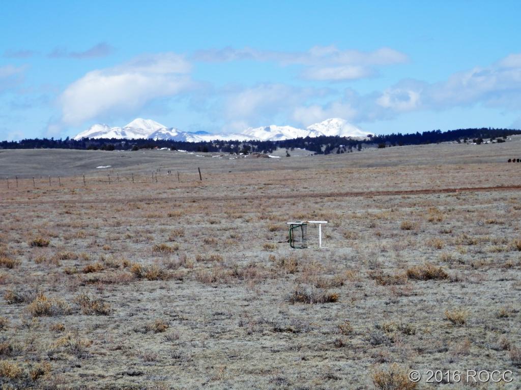 7434 Larimer Road Hartsel, CO 80449 - Photo 3 of 11 a view of a lake from a yard