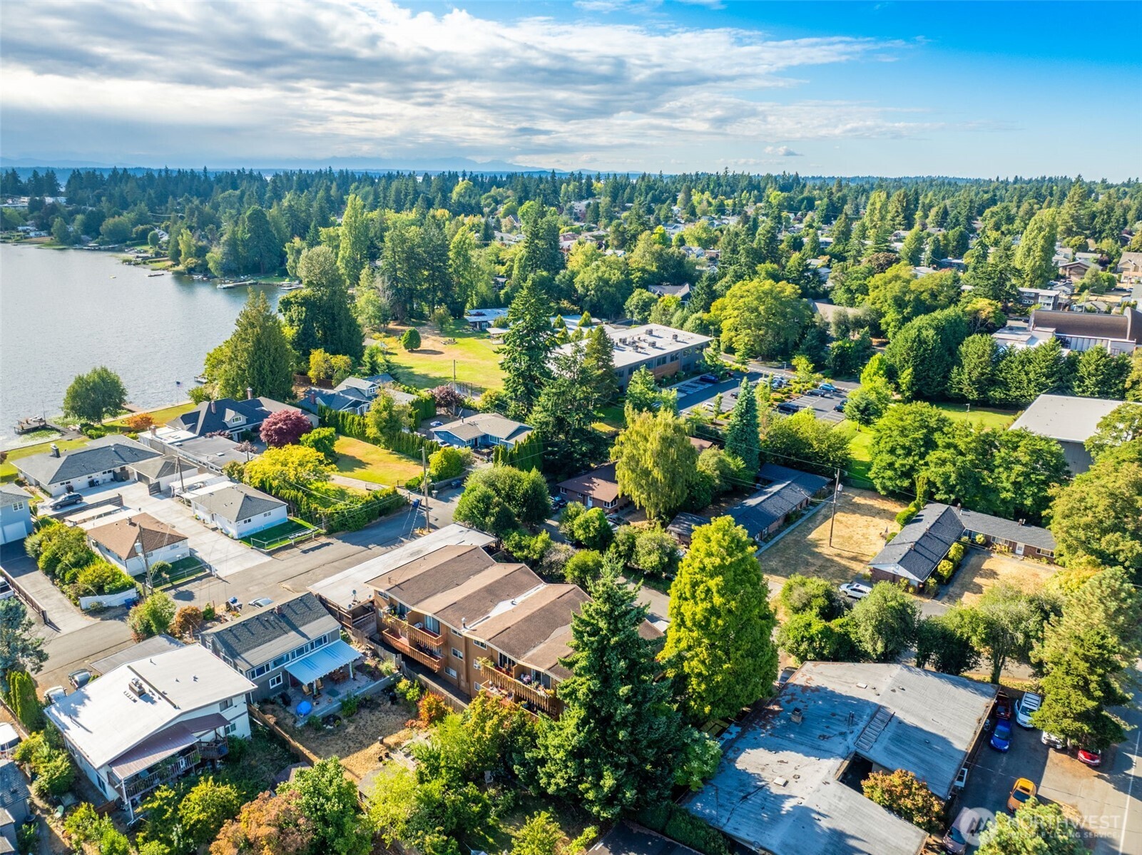 1017 Southwest 154th Street Burien, WA 98166 - Photo 2 of 17 an aerial view of a house with a garden