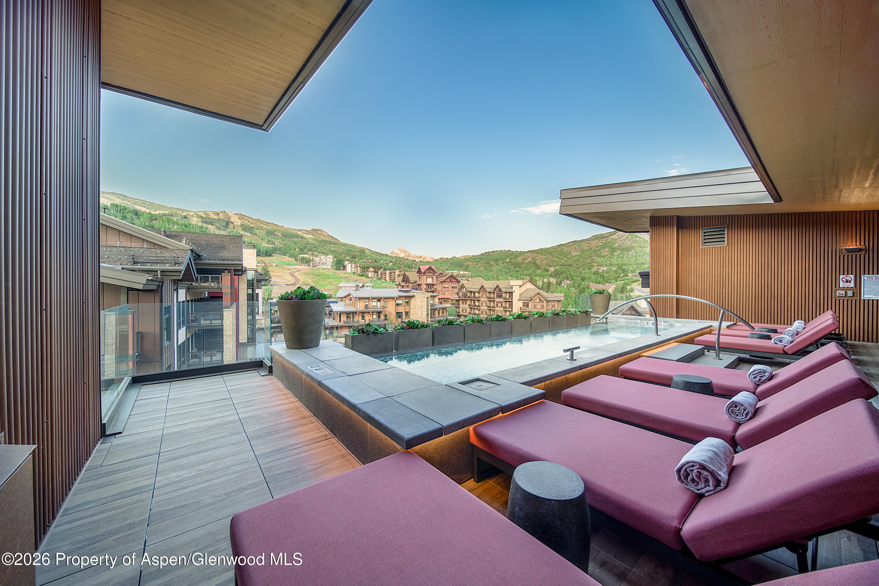 77 Wood Road, Unit 50711 Snowmass Village, CO 81615 - Photo 14 of 20 an outdoor space with furniture