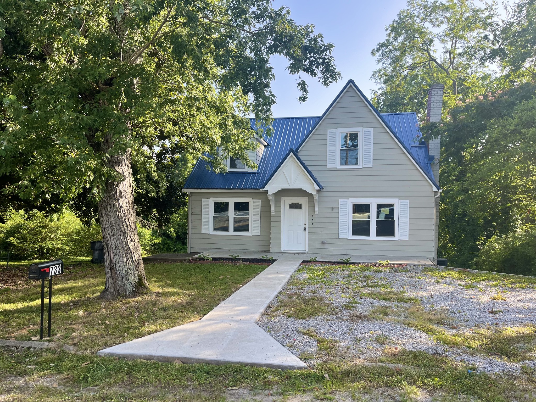 733 East Spring Street Cookeville, TN 38501 - Photo 1 of 23 a front view of house with yard and trees