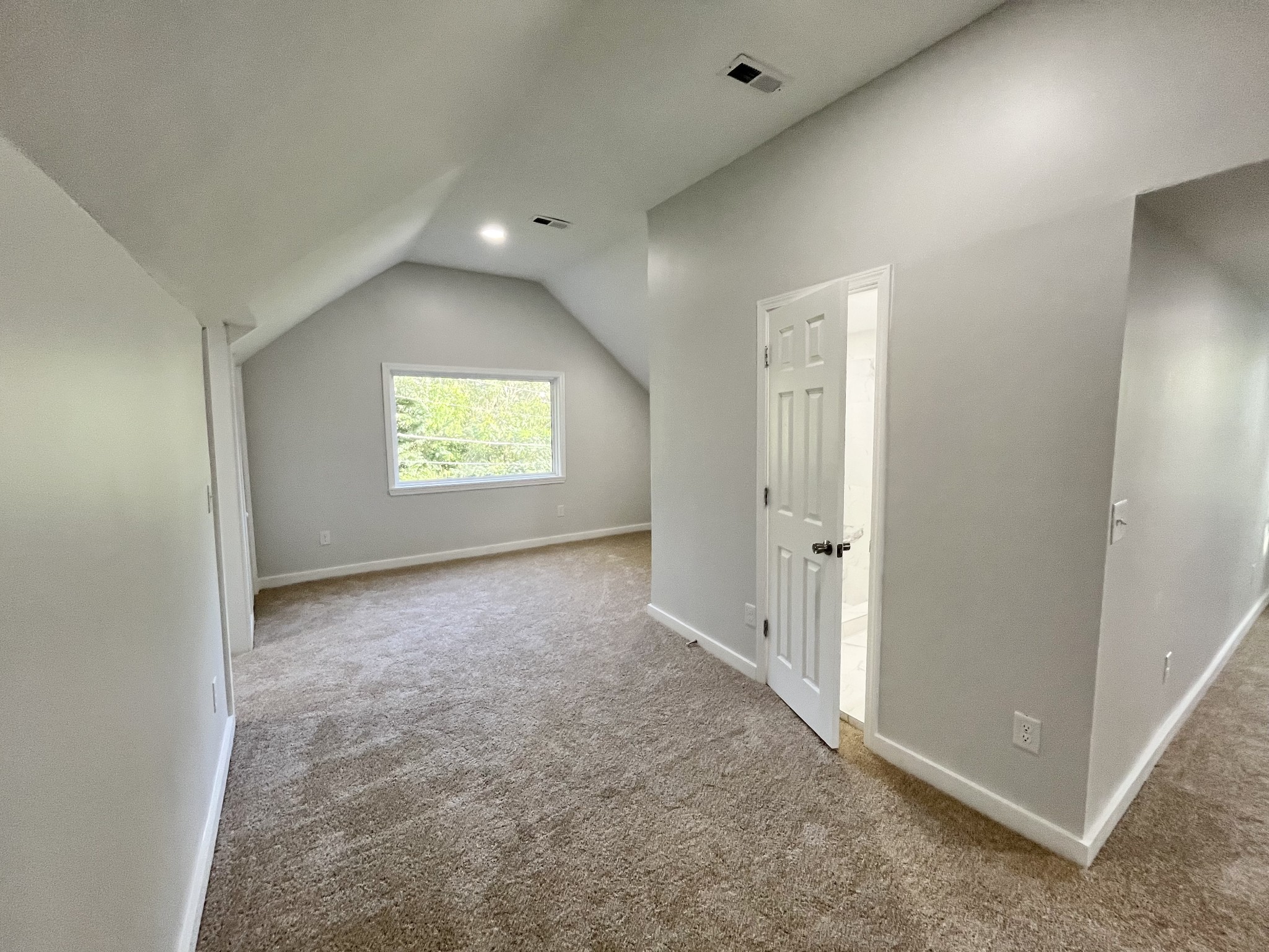 733 East Spring Street Cookeville, TN 38501 - Photo 16 of 23 a view of a big room with windows and mirror