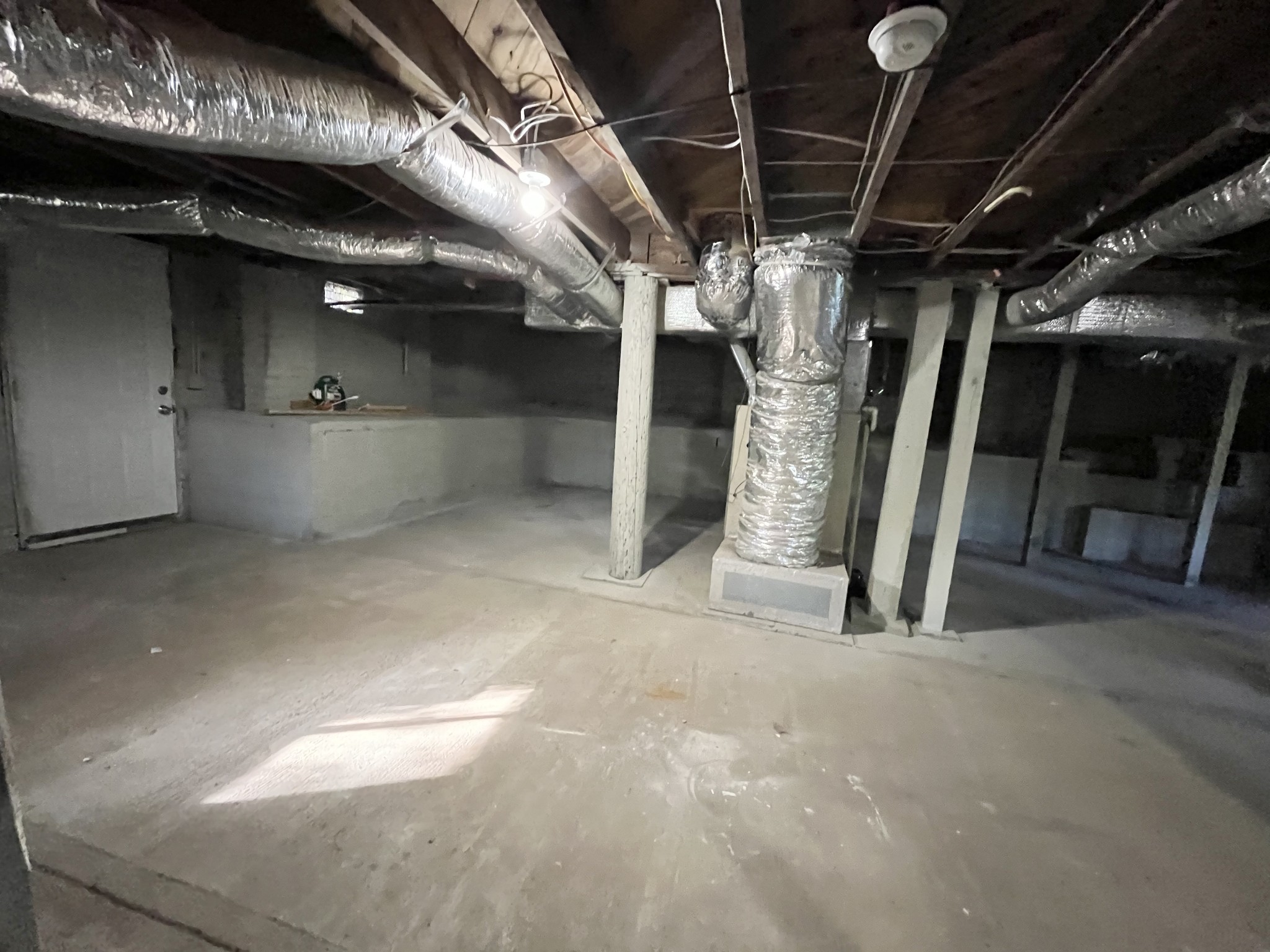 733 East Spring Street Cookeville, TN 38501 - Photo 20 of 23 a view of water heater room with a garage