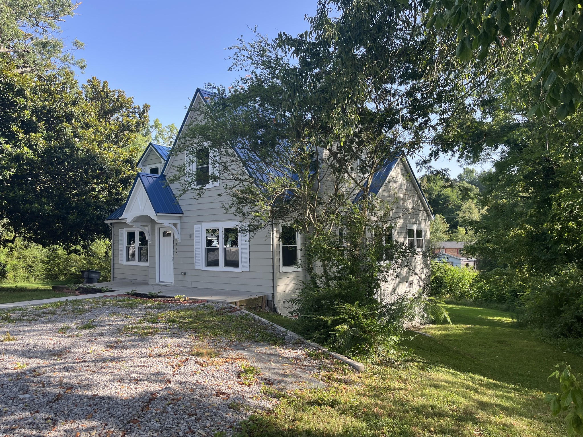 733 East Spring Street Cookeville, TN 38501 - Photo 2 of 23 a house with a tree in front of it