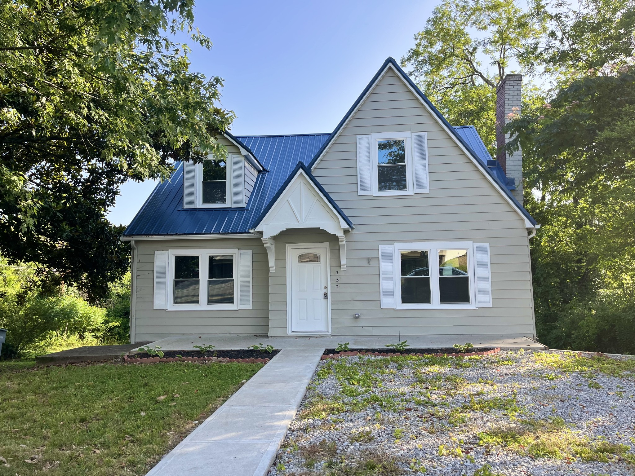 733 East Spring Street Cookeville, TN 38501 - Photo 21 of 23 a view of a house with a yard