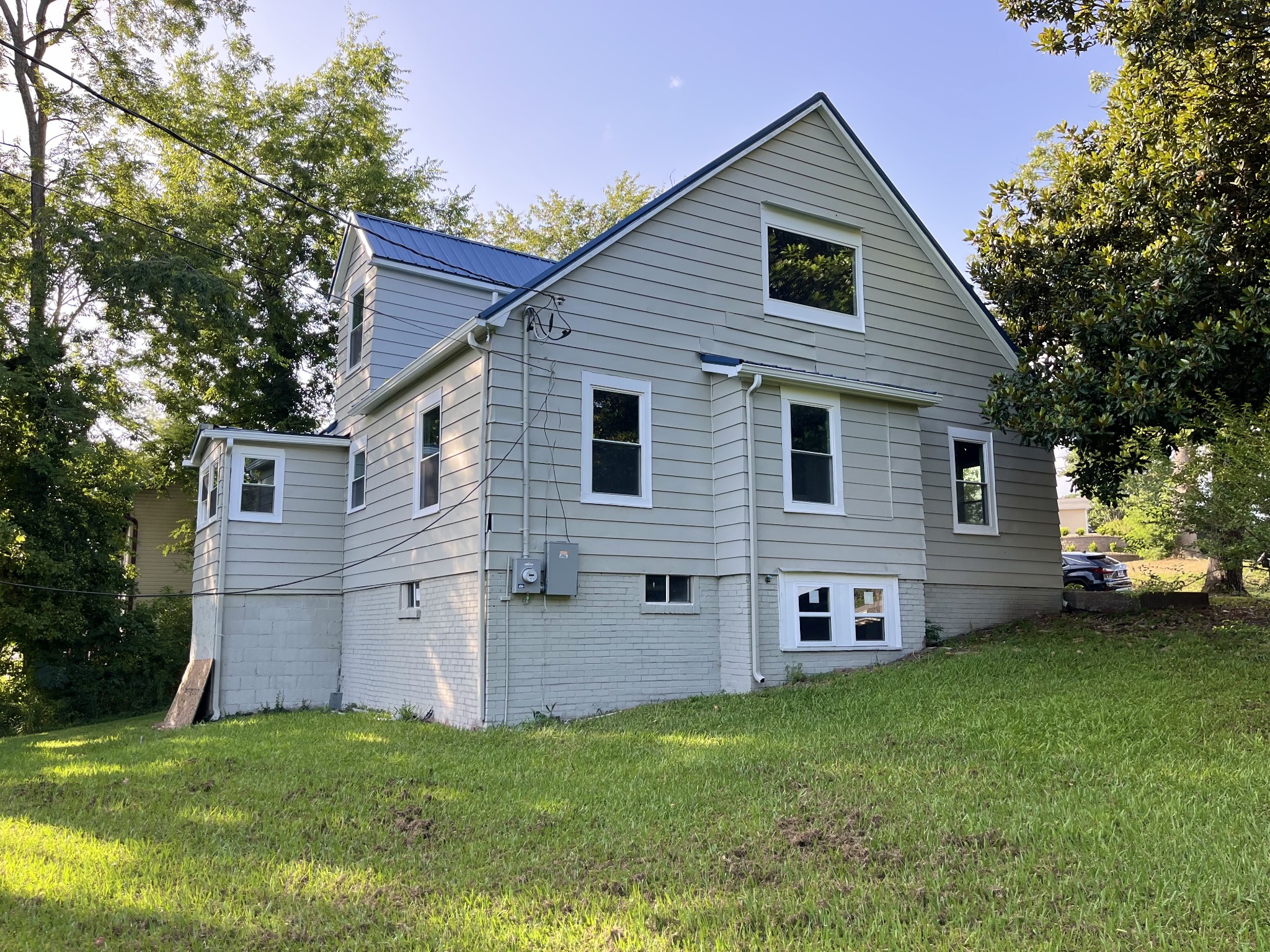 733 East Spring Street Cookeville, TN 38501 - Photo 22 of 23 a view of a house with a yard