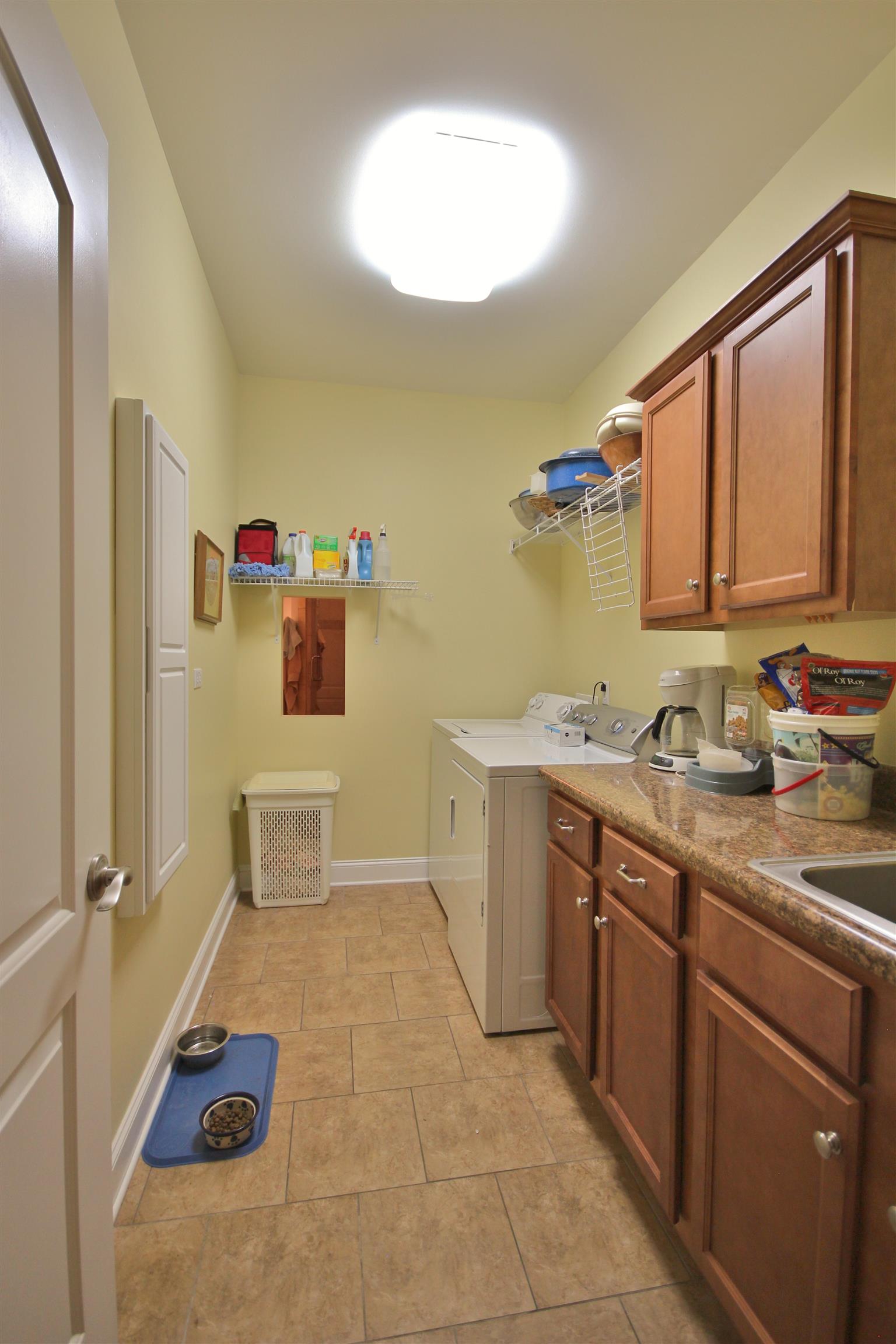 7508 King Road Fairview, TN 37062 - Photo 13 of 30 a room with a sink and a cabinets