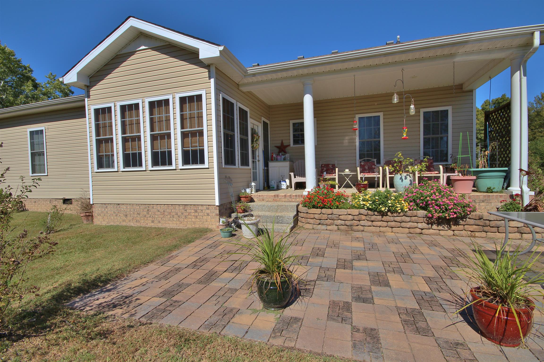 7508 King Road Fairview, TN 37062 - Photo 17 of 30 a front view of a house with patio